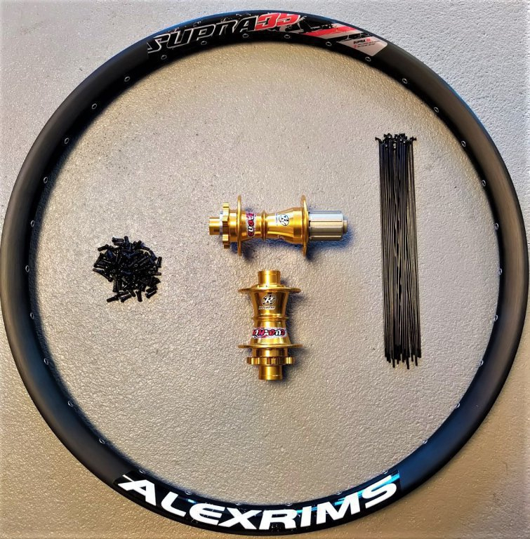 Reverse / Alexrims Laufrad Set 26" sw35-gold