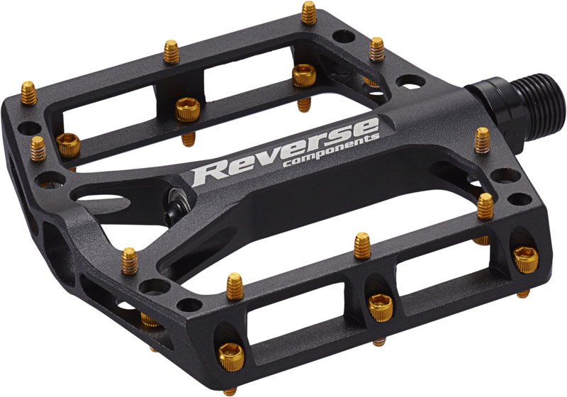 Reverse Components REVERSE Pedal "Black one" black / gold 325g, schwarz / gold